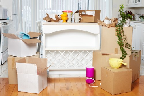 Packed boxes and furniture ready for a local move in Kentish Town