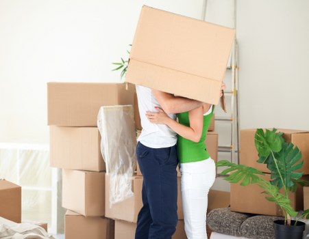Office removal process with furniture handling and unloading at a new site